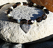 Sterling silver heart bracelet on elastic with smoky quartz and mother of pearl