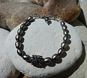 Sterling silver ethnic bead and freshwater pearl bracelet