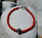 Bracelet with sterling silver ethnic bead and coral