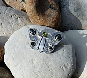 Sterling silver butterfly brooch with peridot and haemetite