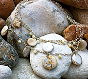 Agate lava and mother of pearl necklace on 3 lengths of sterling silver chain