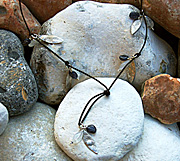 Necklace with Iolite, rainbow moonstone and sterling silver leaves on brown leather