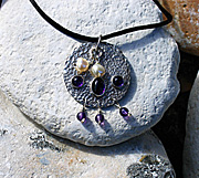 Sterling silver necklace on black silk ribbon with amethysts and freshwater pearls