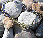 Three 40cm strands necklace of grey freshwater pearls and lemon quartz