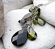 Pendant with onyx, olive cubic zirconia, Swarovski crystals and sterling silver ethnic beads (50cm drop)