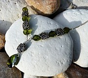 Necklace with sterling silver ethnic beads, Swarovski crystals and olive cubic zirconia